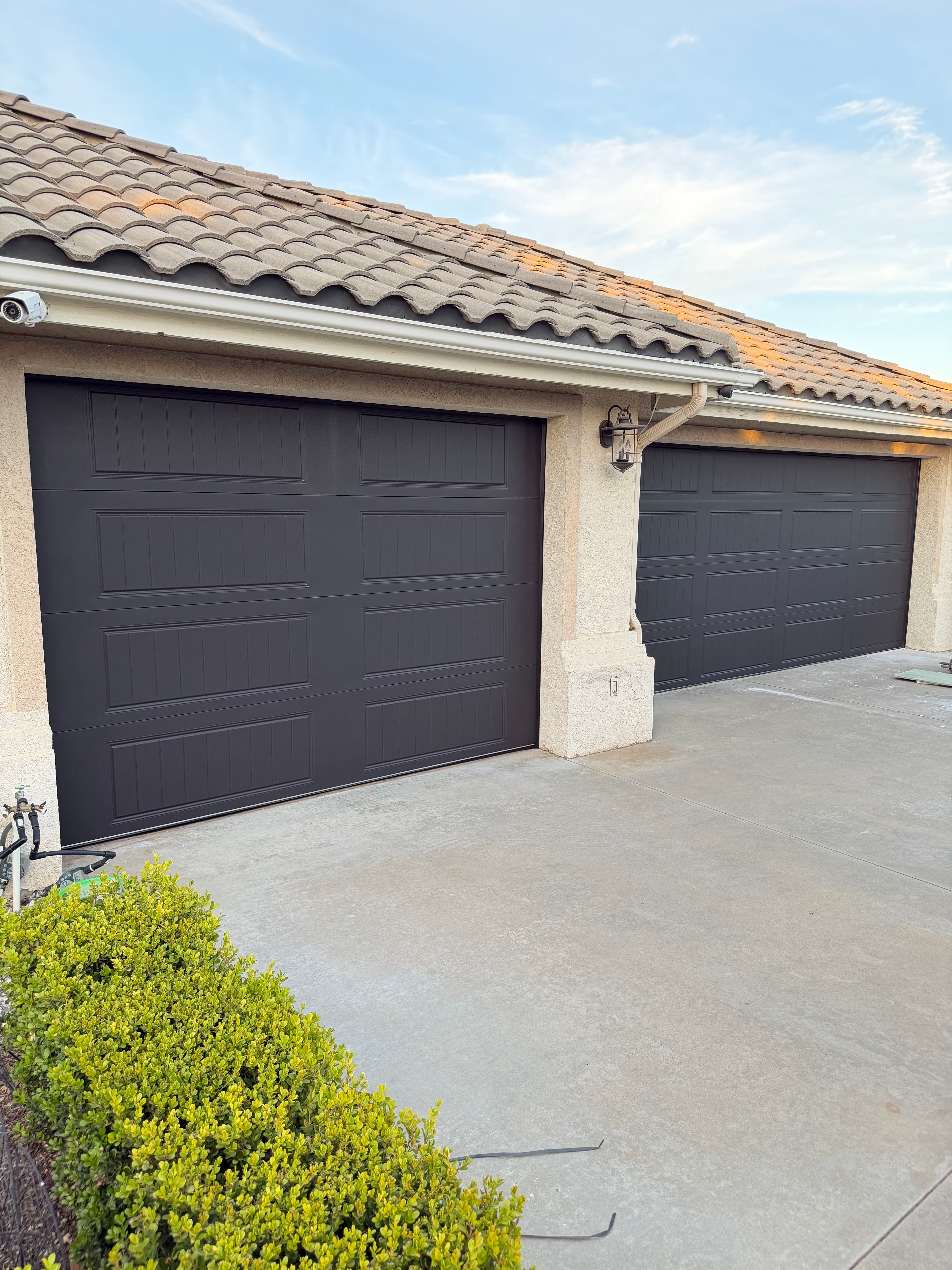 Project SunRay Overhead Doors Installs Elegant Clopay Gallery Doors image