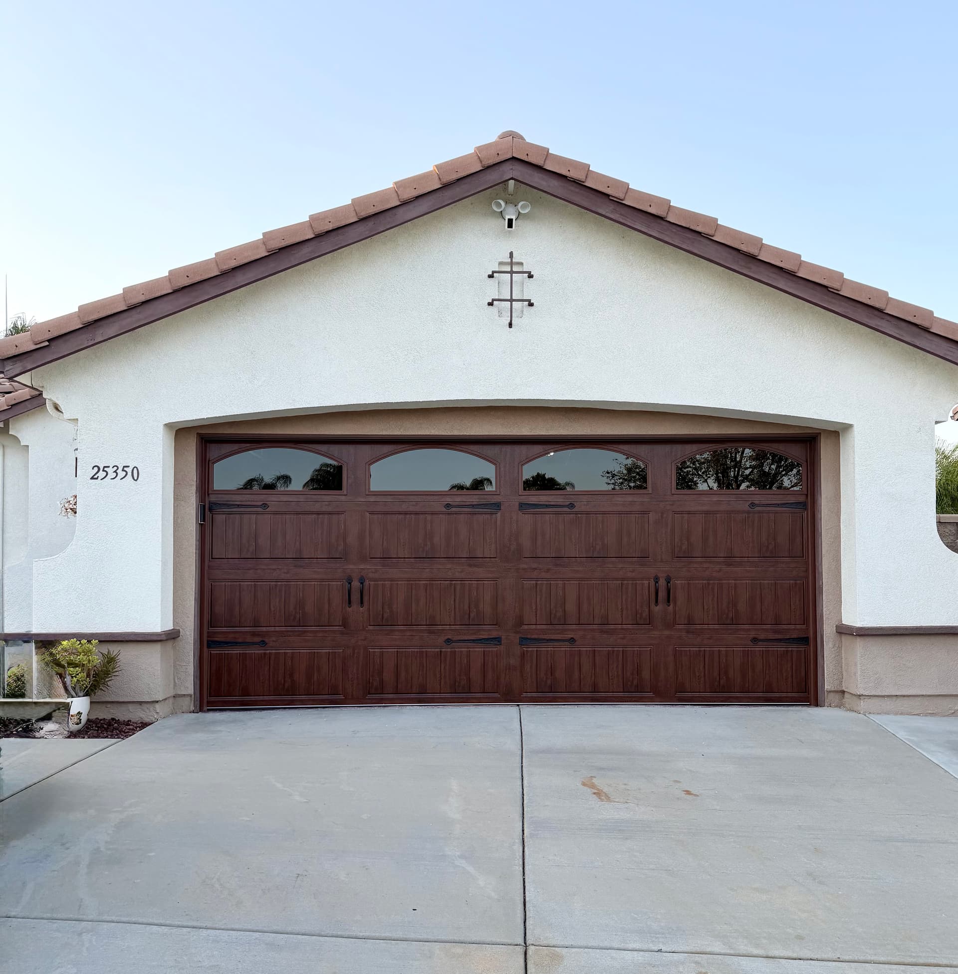 Gallery photos for Clopay Gallery Walnut Garage Door with Arched Windows: Image #1