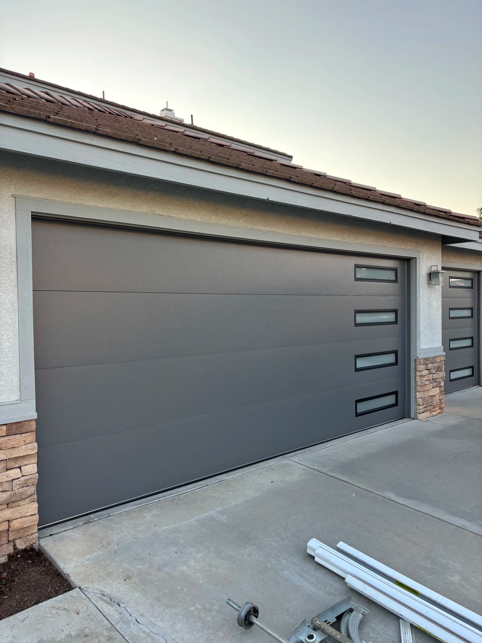 Gallery photos for Clopay Steel Doors with Lustra Finish Give This Home a Sharp New Look: Image #2