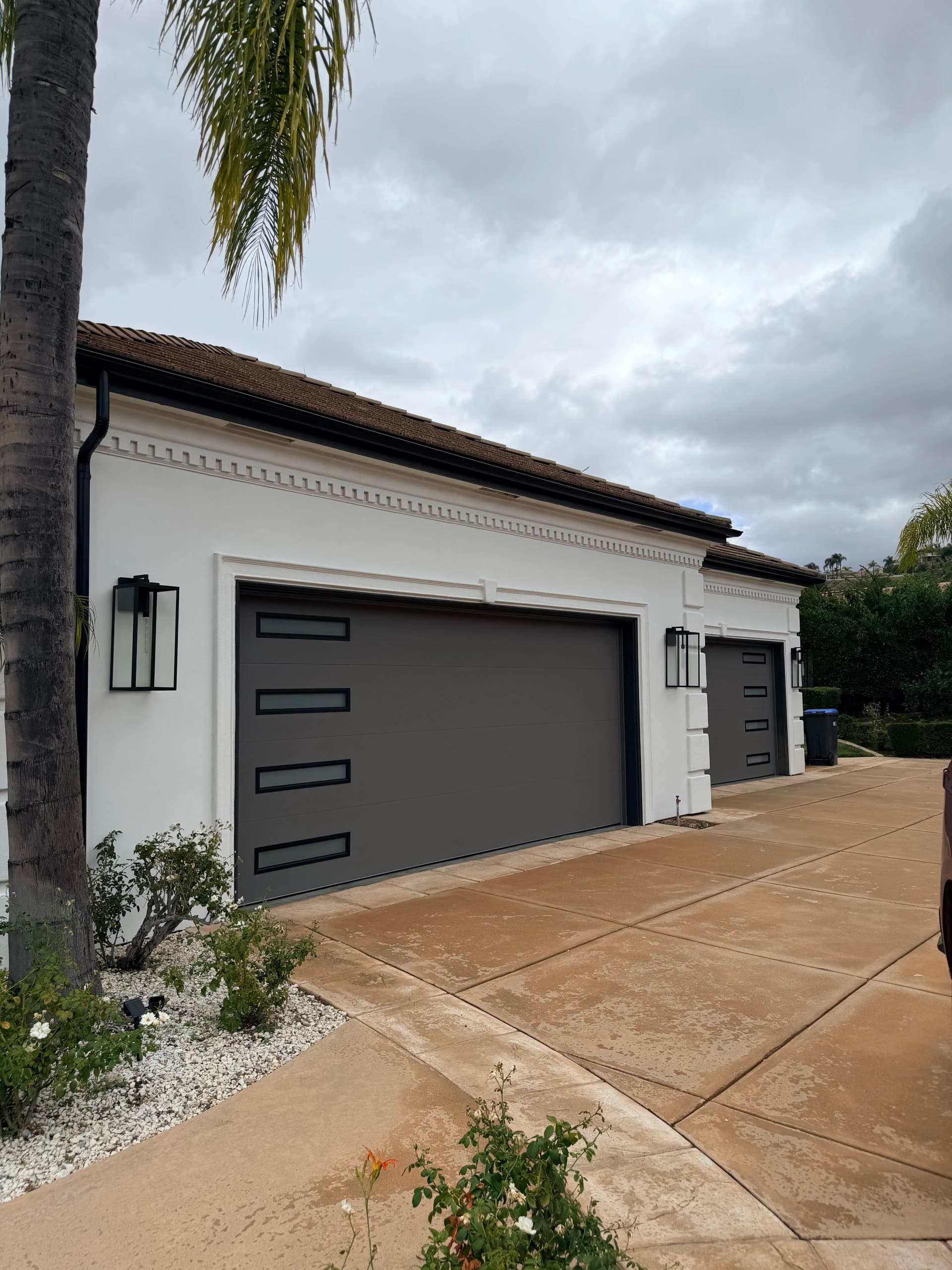 Clopay Modern Steel Doors in Lustra Charcoal with Slim Windows image