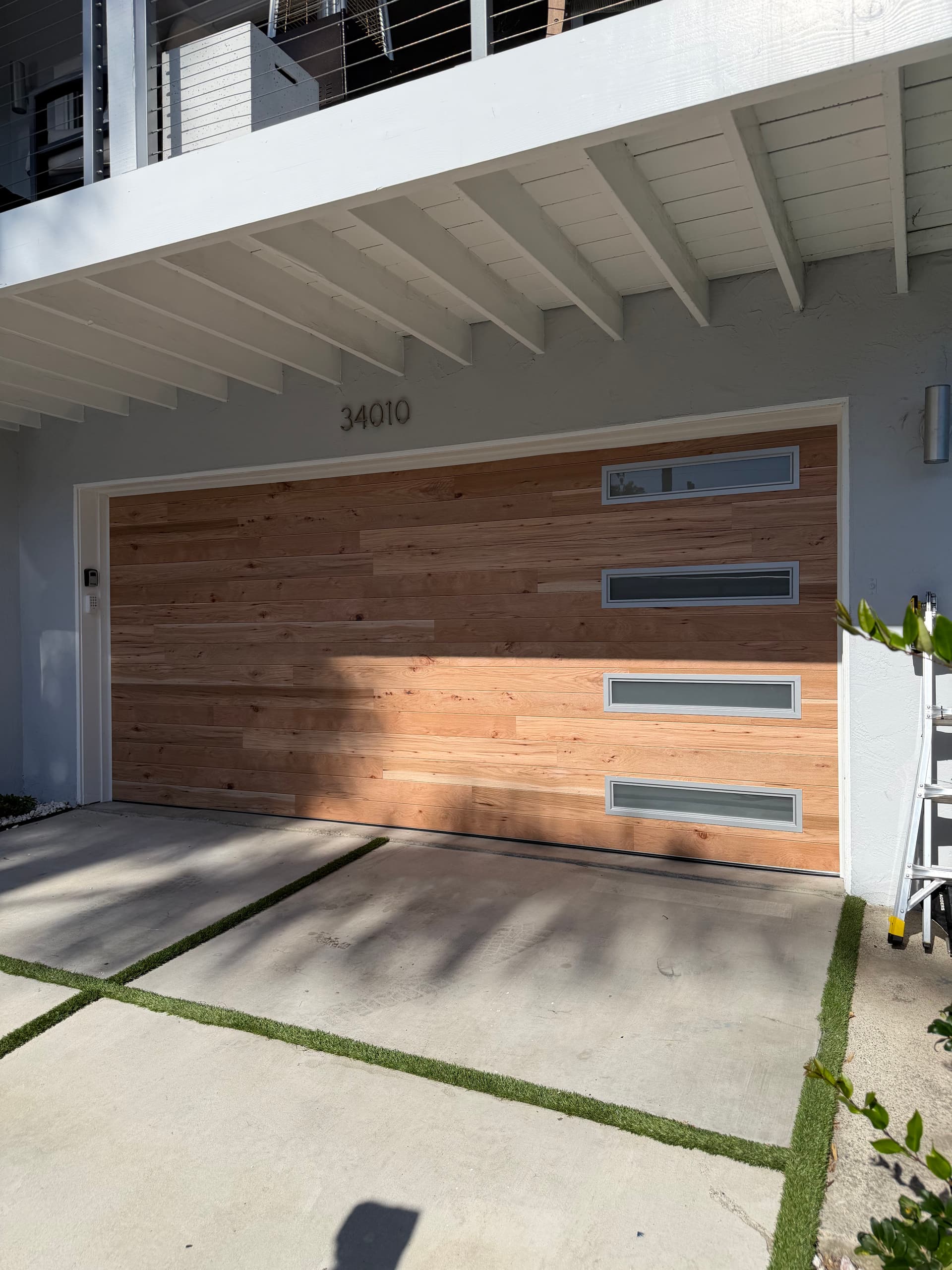 Gallery photos for Clopay Steel Door with a Natural Wood Finish That Actually Delivers: Image #1