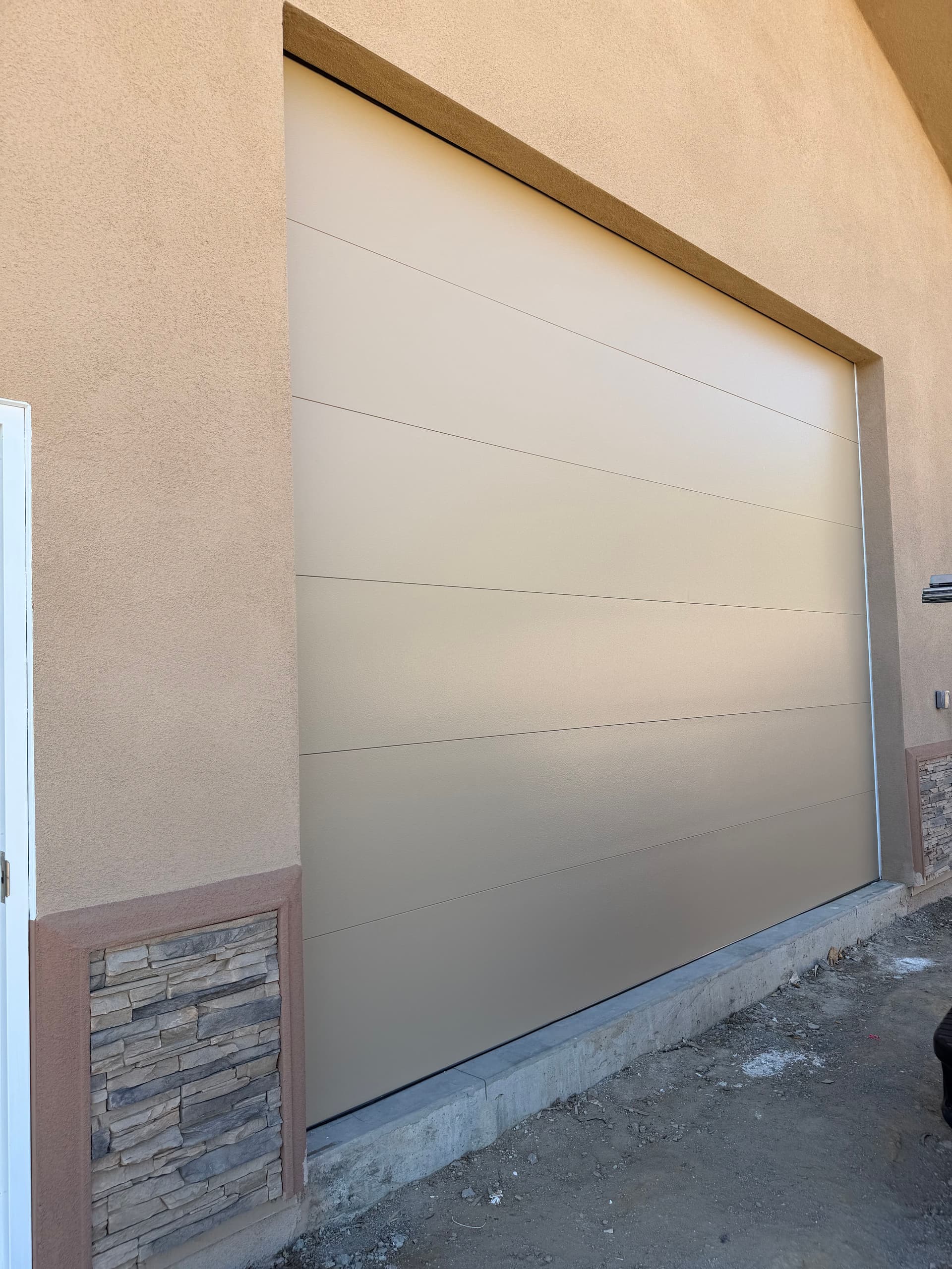 Large Clopay Insulated Commercial Garage Door Installation image