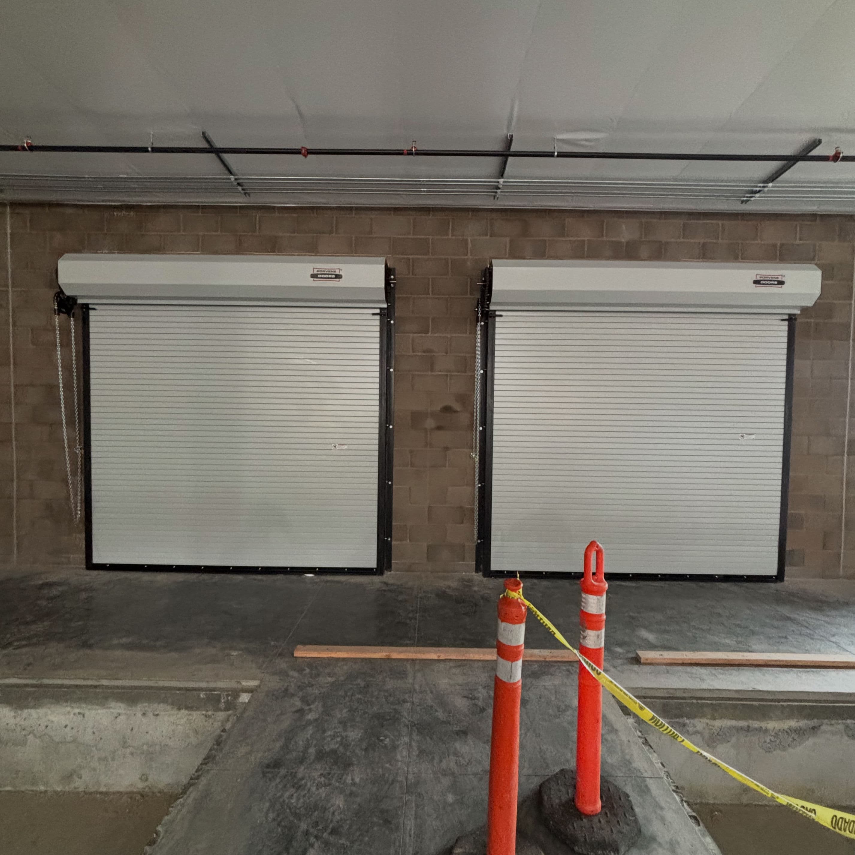 Project Porvene 422 Service Roll-Up Doors Installed and Ready to Work image