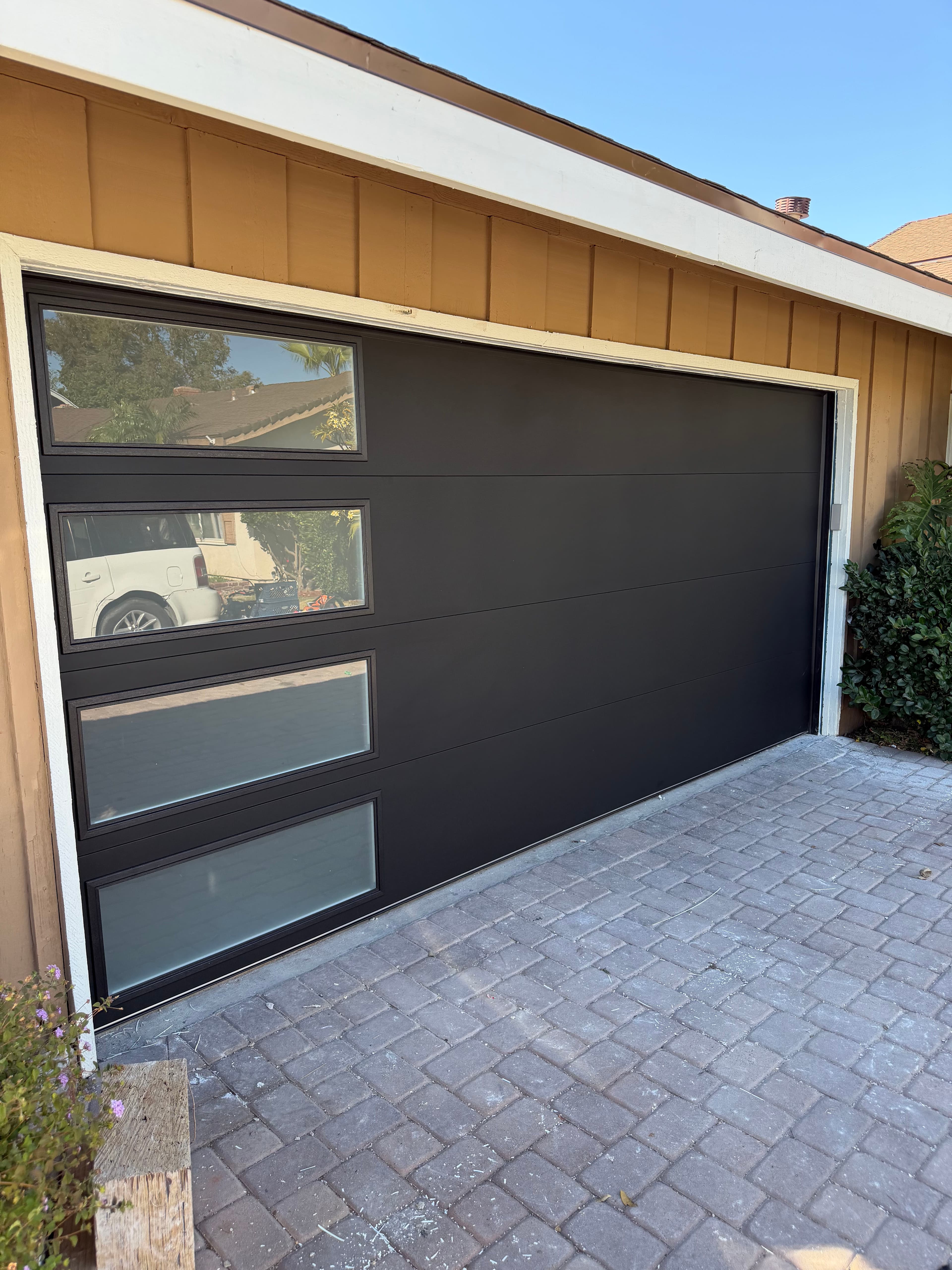 Project Clopay Modern Steel Door Install in Lustra Black image