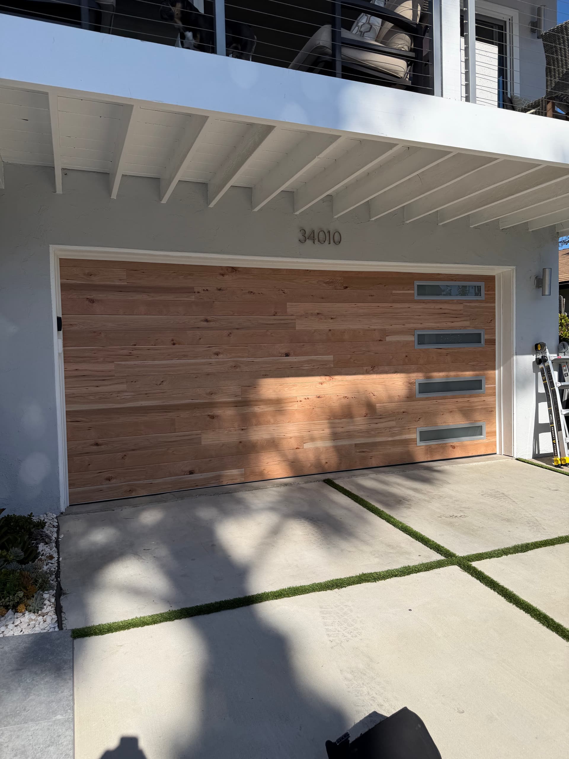 Gallery photos for Clopay Steel Door with a Natural Wood Finish That Actually Delivers: Image #2