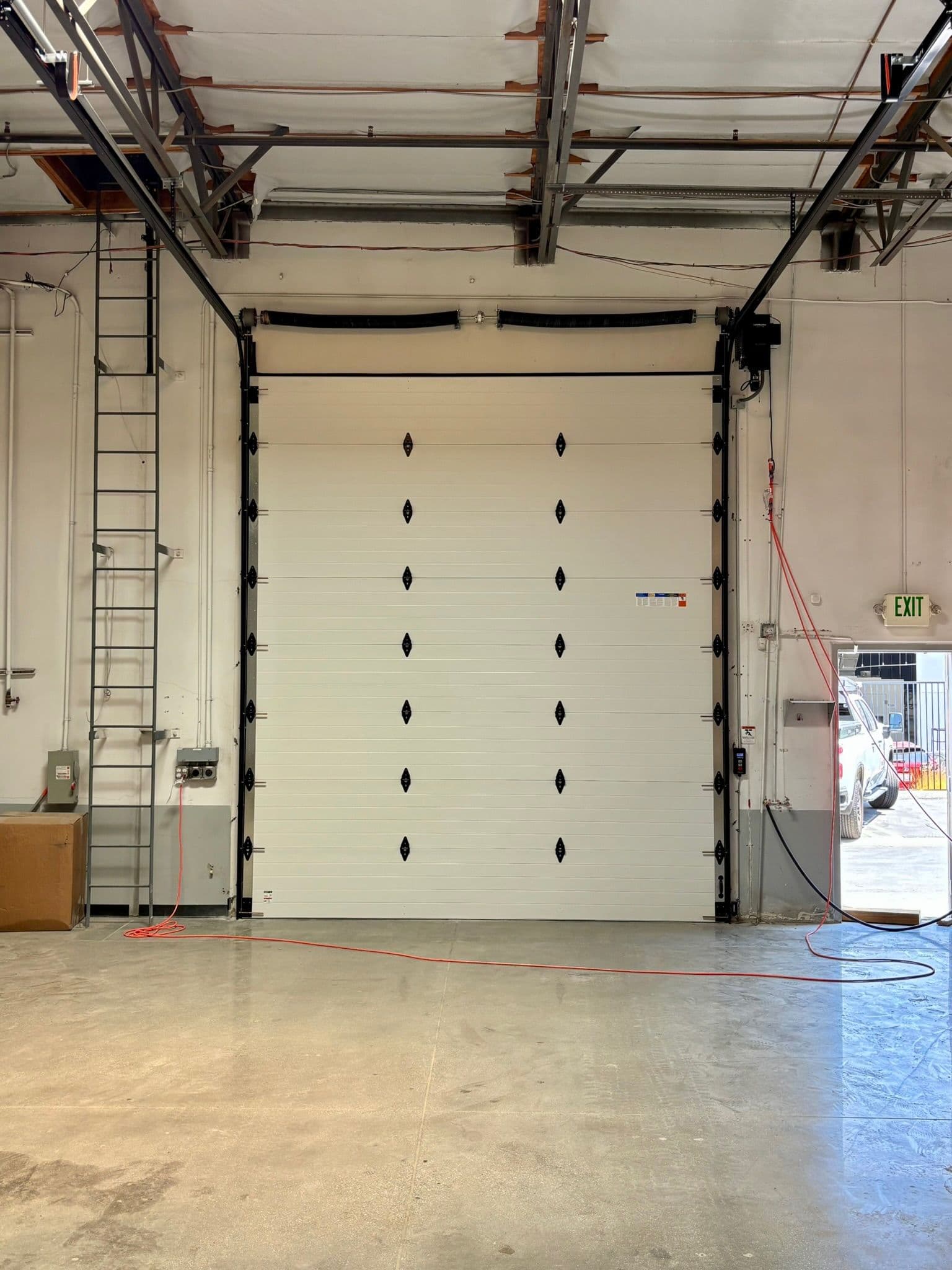 Clopay Commercial Insulated Door Built for Busy Workspaces image